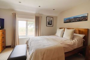 Bedroom One- click for photo gallery